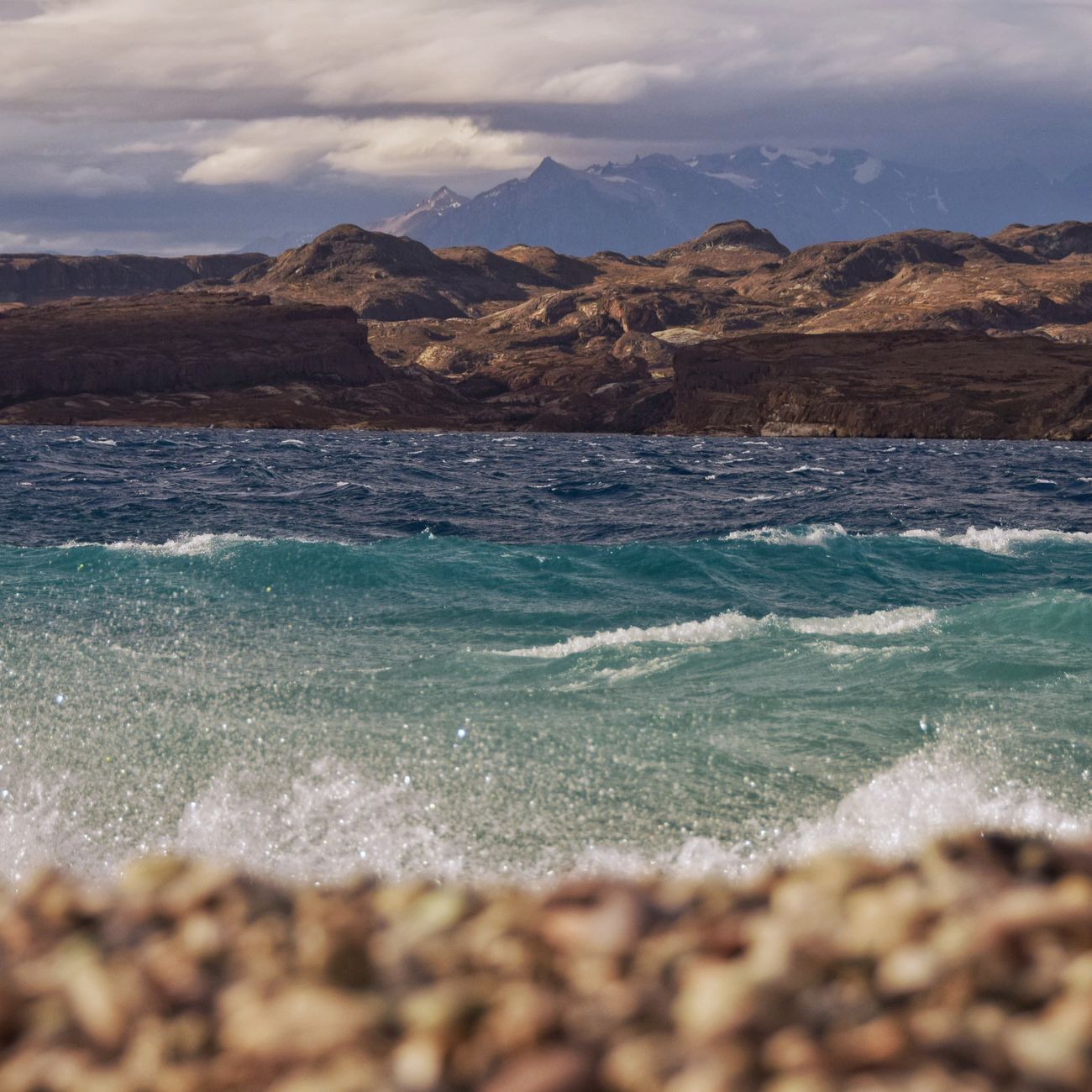Dramatic windswept lake and mountains in Chilean Patagonia