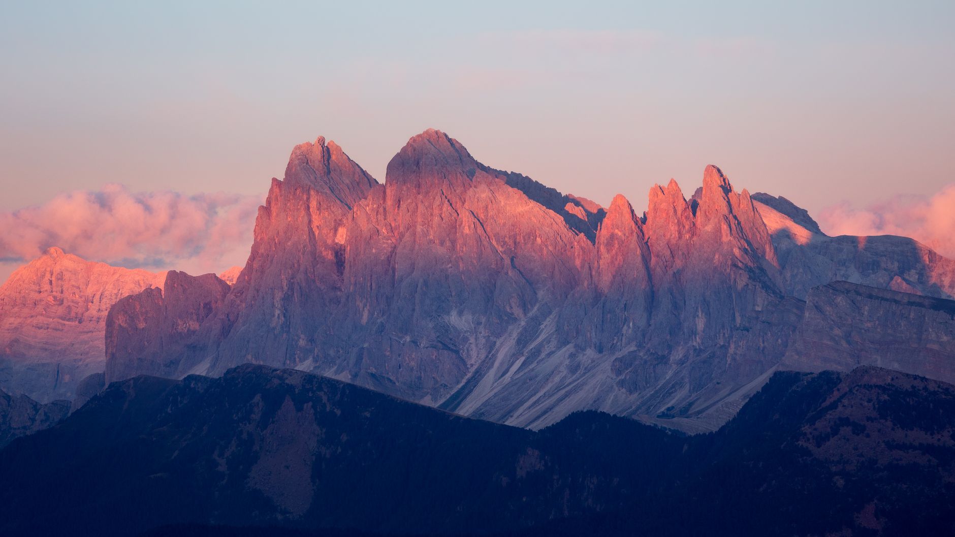 Dolomites limestone peaks illuminated at sunset